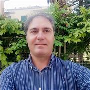 Docente Di Economia Aziendale impartisce lezioni su partita doppia, bilancio e budget